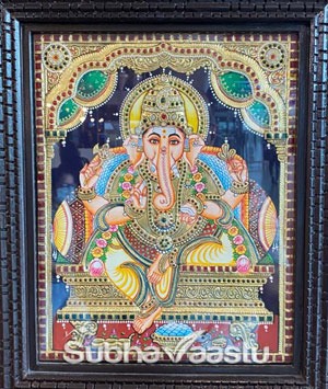 Arranging Lord Ganesha Photo on Entrance door